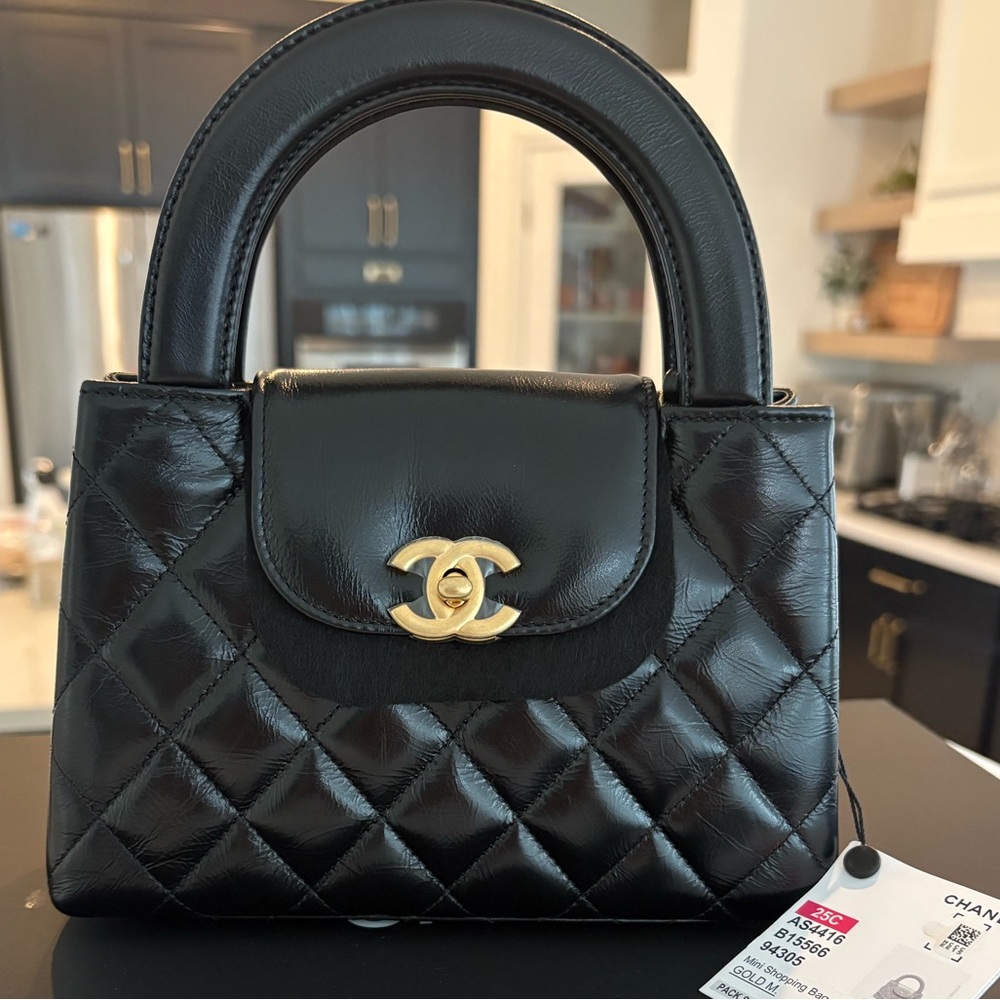 Chanel black Kelly nano (largest size)